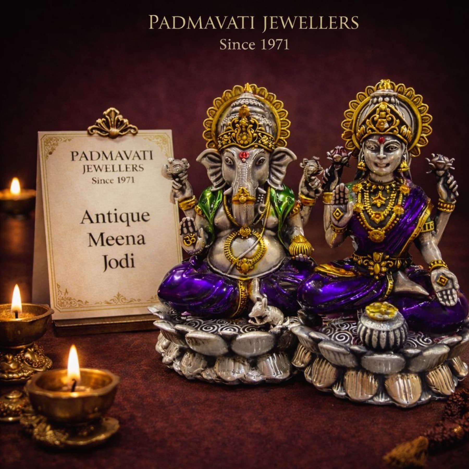 Antique meena Ganpati and Lakshmi jodi with lit diyas